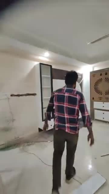Bedroom wardrobe with LED backlit shelving, Awadh Interior
