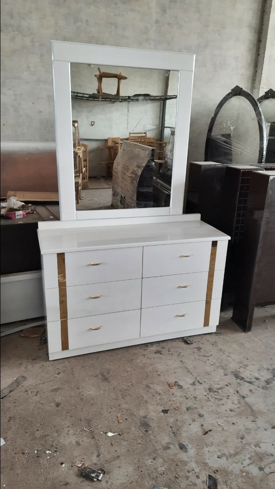 White dresser with mirror and gold accent drawer handles