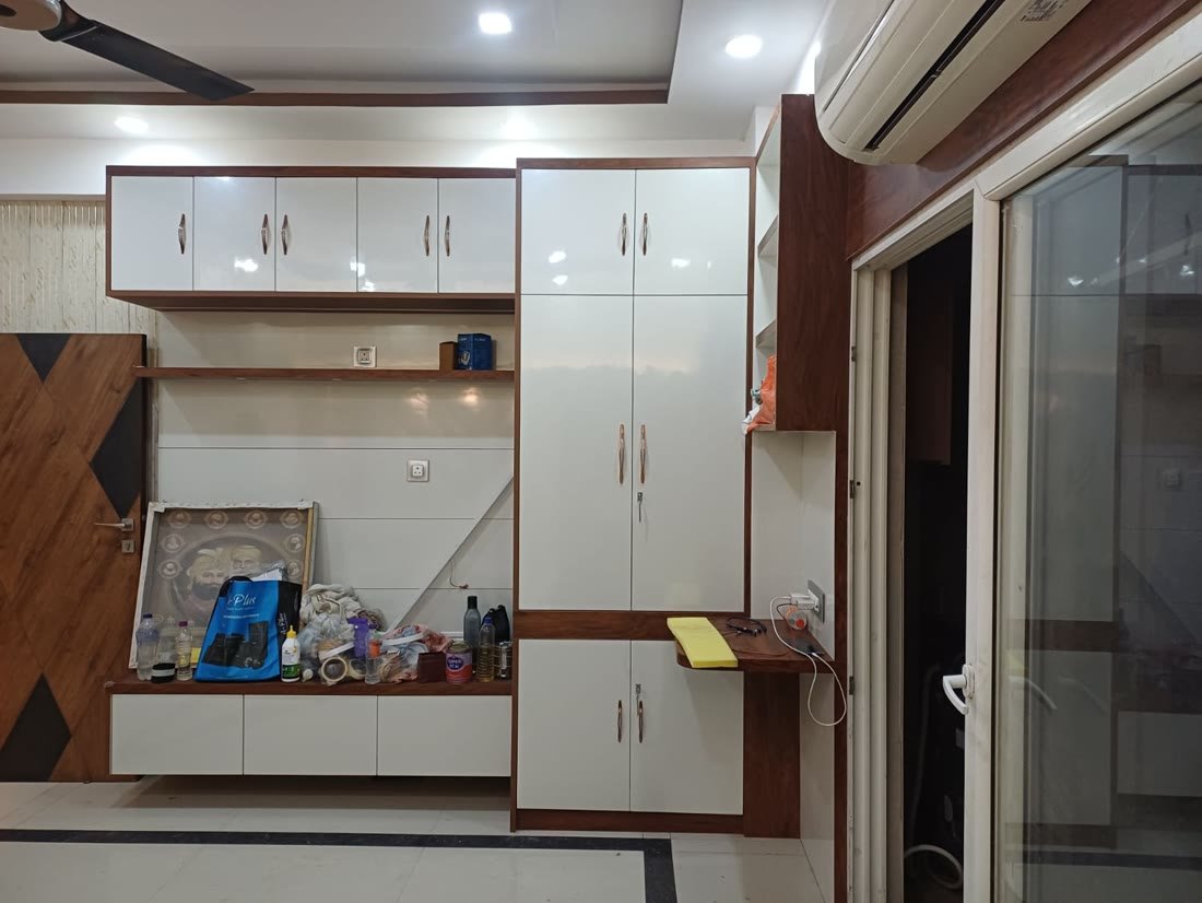 Living room overhead cabinets and wardrobe storage wall